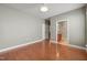 Spacious bedroom with wood floors and en suite bathroom access at 621 Aylestone Dr, Cary, NC 27519