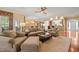Spacious living room with hardwood floors, fireplace, and views of the dining area at 621 Aylestone Dr, Cary, NC 27519