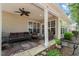 Relaxing covered patio with outdoor seating, perfect for enjoying the serene backyard at 621 Aylestone Dr, Cary, NC 27519