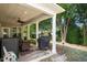 Covered patio with a fan, outdoor seating, and a grill at 621 Aylestone Dr, Cary, NC 27519