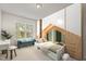This well-lit bedroom showcases custom-built ins and a cozy bench near the window at 8323 Yaxley Hall Dr, Raleigh, NC 27616
