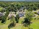 Stunning aerial view of this beautiful estate nestled on a sprawling wooded lot in a private neighborhood at 940 Rivers Edge Dr, Graham, NC 27253