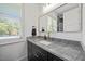 Modern bathroom vanity with marble countertop and black fixtures at 940 Rivers Edge Dr, Graham, NC 27253