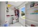 Organized walk-in closet featuring shelving, hanging rods, and storage bins for optimal organization at 940 Rivers Edge Dr, Graham, NC 27253