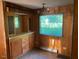 Dining area featuring built-in cabinets and window with natural light at , Cameron, NC 28326