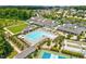 Community pool and clubhouse with tennis and pickleball courts at 1004 Sounding Ln, Durham, NC 27703