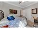 Comfortable bedroom with large closet, plush bedding, and ample natural light at 1004 Sounding Ln, Durham, NC 27703