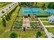 Well-maintained community garden, walking paths, and tennis courts at 1004 Sounding Ln, Durham, NC 27703