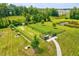 Fenced Community Dog Park with lush greenery, benches, and walking path at 1004 Sounding Ln, Durham, NC 27703