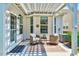 Covered outdoor patio featuring comfortable seating and a pergola, perfect for relaxation at 1004 Sounding Ln, Durham, NC 27703