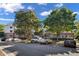 Multi-story condo building with parking and landscaping showing a convenient and charming neighborhood at 108-203 Northbrook Dr # 203, Raleigh, NC 27609