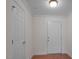 Bright foyer with hardwood floors and a white front door, offering a welcoming entrance at 108-203 Northbrook Dr # 203, Raleigh, NC 27609
