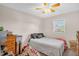 Bedroom with neutral walls, ceiling fan, and a window with blinds at 117 James Dr, Pine Level, NC 27568