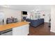 Open floor plan view of the living room and butcher block countertop at 117 James Dr, Pine Level, NC 27568