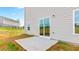 Backyard view with a patio, a sliding glass door to the home, and a partially fenced yard at 119 Leven Dr, Gibsonville, NC 27249