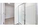 Bathroom with a glass-enclosed shower and a closet, offering a sleek and functional design at 119 Leven Dr, Gibsonville, NC 27249