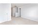 Upstairs hallway with plush carpet and doors leading to the bedroom and other rooms at 119 Leven Dr, Gibsonville, NC 27249