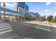 Modern building complex with a globe, street, pedestrian bridge, and modern architectural design at 1246 Coach Station Aly # 101, Raleigh, NC 27601