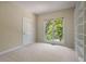 Bedroom featuring a window and built-in shelves at 125 Chimney Rise Dr, Cary, NC 27511