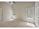 Spacious bedroom with vaulted ceilings and plenty of natural light at 125 Chimney Rise Dr, Cary, NC 27511