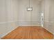 Bright dining room featuring hardwood flooring and natural light at 125 Chimney Rise Dr, Cary, NC 27511