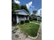 Charming single-story home with stone accents and a well-maintained lawn and shrubbery at 1305 E Jones St, Raleigh, NC 27610