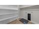 Functional walk-in closet includes shelving and hanging rods for efficient organization at 1400 Gathering Park Cir # 203, Cary, NC 27519