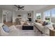 Spacious living room with hardwood floors, a fireplace, and stylish decor at 1400 Gathering Park Cir # 301, Cary, NC 27519