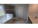 Bathroom with a gray-tiled shower, soaking tub, and gray vanity at 147 River Chapel Dr, Fuquay Varina, NC 27526