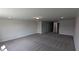 Huge bonus room area features carpeted flooring and ample recessed lighting at 147 River Chapel Dr, Fuquay Varina, NC 27526