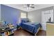 Bedroom with ceiling fan, hardwood floor, and natural light at 1508 Carroll Heights Rd, Zebulon, NC 27597