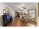 Open kitchen and dining area with hardwood floors and stainless steel appliances at 1508 Carroll Heights Rd, Zebulon, NC 27597