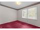 Bedroom featuring red carpet, a large window and floral wallpaper border at 18 Red Pine Rd, Chapel Hill, NC 27516