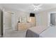 Bedroom with a walk in closet, full dresser, and a door leading to the en-suite bathroom at 208 Holly Green Ln, Holly Springs, NC 27540