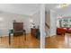 View of the home office next to the stairway and front living area at 208 Holly Green Ln, Holly Springs, NC 27540