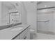 Bright bathroom featuring a modern vanity, shower, and toilet, all in a clean, streamlined design at 2112 Colin Hill Ct, Wake Forest, NC 27587