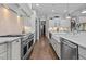 Gourmet kitchen with stainless appliances and designer backsplash at 2112 Colin Hill Ct, Wake Forest, NC 27587