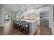 Modern kitchen with large island, stainless steel appliances, and open layout at 2112 Colin Hill Ct, Wake Forest, NC 27587