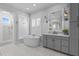 This stylish bathroom offers a soaking tub, a separate shower, and a sink at 2112 Colin Hill Ct, Wake Forest, NC 27587