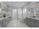This stylish bathroom offers double sinks, a soaking tub, and a separate shower at 2112 Colin Hill Ct, Wake Forest, NC 27587