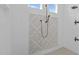 This luxurious shower features a decorative accent tile and dual shower heads at 2112 Colin Hill Ct, Wake Forest, NC 27587