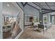 Open concept leading to screened porch with stone floors at 2112 Colin Hill Ct, Wake Forest, NC 27587