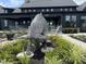 Sculptural art in a well-maintained front yard, set against a modern home facade at 2112 Pink Peony Cir # 149, Durham, NC 27703