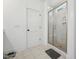 This bright and spacious bathroom features a glass enclosed walk-in shower at 237 Emory Bluffs Dr, Holly Springs, NC 27540