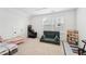 Playful bedroom features ample natural light, sleeping area, and activity area at 237 Emory Bluffs Dr, Holly Springs, NC 27540