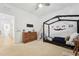 Spacious bedroom is designed for a , featuring a unique bed frame and playful decor at 237 Emory Bluffs Dr, Holly Springs, NC 27540