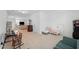 This playroom features ample space, play piano, reading area, and sleeping area at 237 Emory Bluffs Dr, Holly Springs, NC 27540