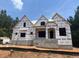 New home under construction showcases a modern design with clean lines and durable materials at 30 Cherry Bark Dr, Youngsville, NC 27596