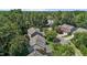 Lush landscaping and mature trees surround this traditional home in a peaceful, desirable neighborhood at 308 Sutton Glen Dr, Apex, NC 27523