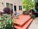 The home features a welcoming back deck perfect for outdoor seating and dining and entertaining guests in the open air at 308 Sutton Glen Dr, Apex, NC 27523